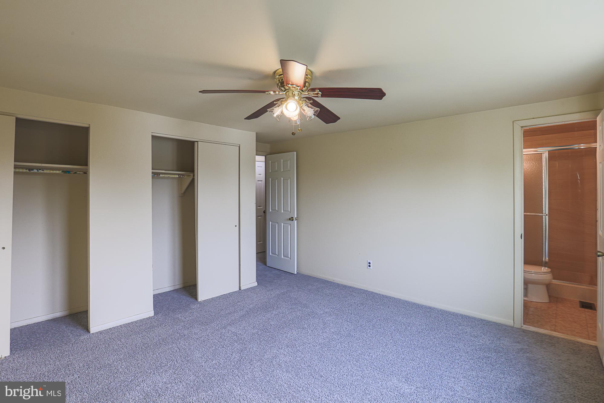 3923 Millner Road Baltimore, MD 21236 - Photo 17 of 38 a view of empty room with ceiling fan