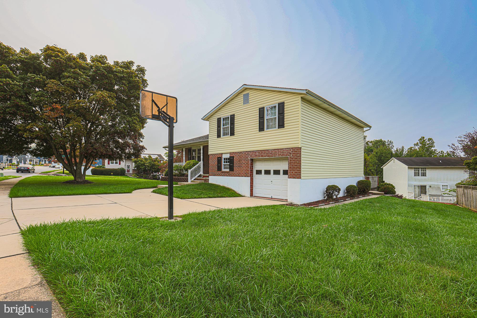 3923 Millner Road Baltimore, MD 21236 - Photo 2 of 38 a view of a house with a yard and sitting area