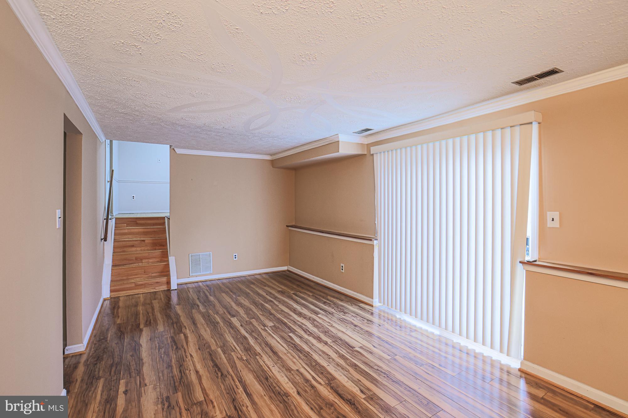 3923 Millner Road Baltimore, MD 21236 - Photo 27 of 38 a view of a room with wooden floor