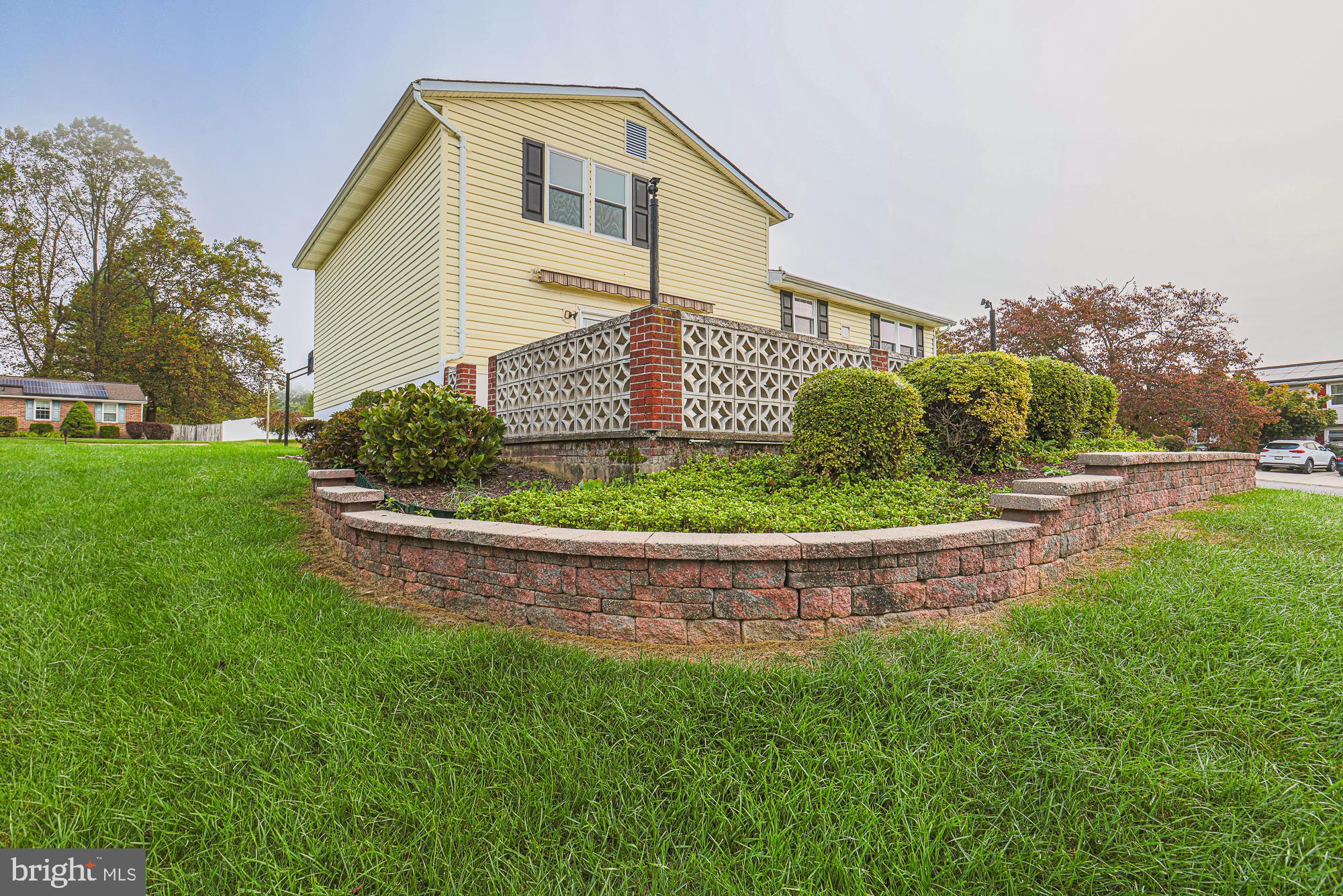 3923 Millner Road Baltimore, MD 21236 - Photo 36 of 38 a front view of a house with a yard