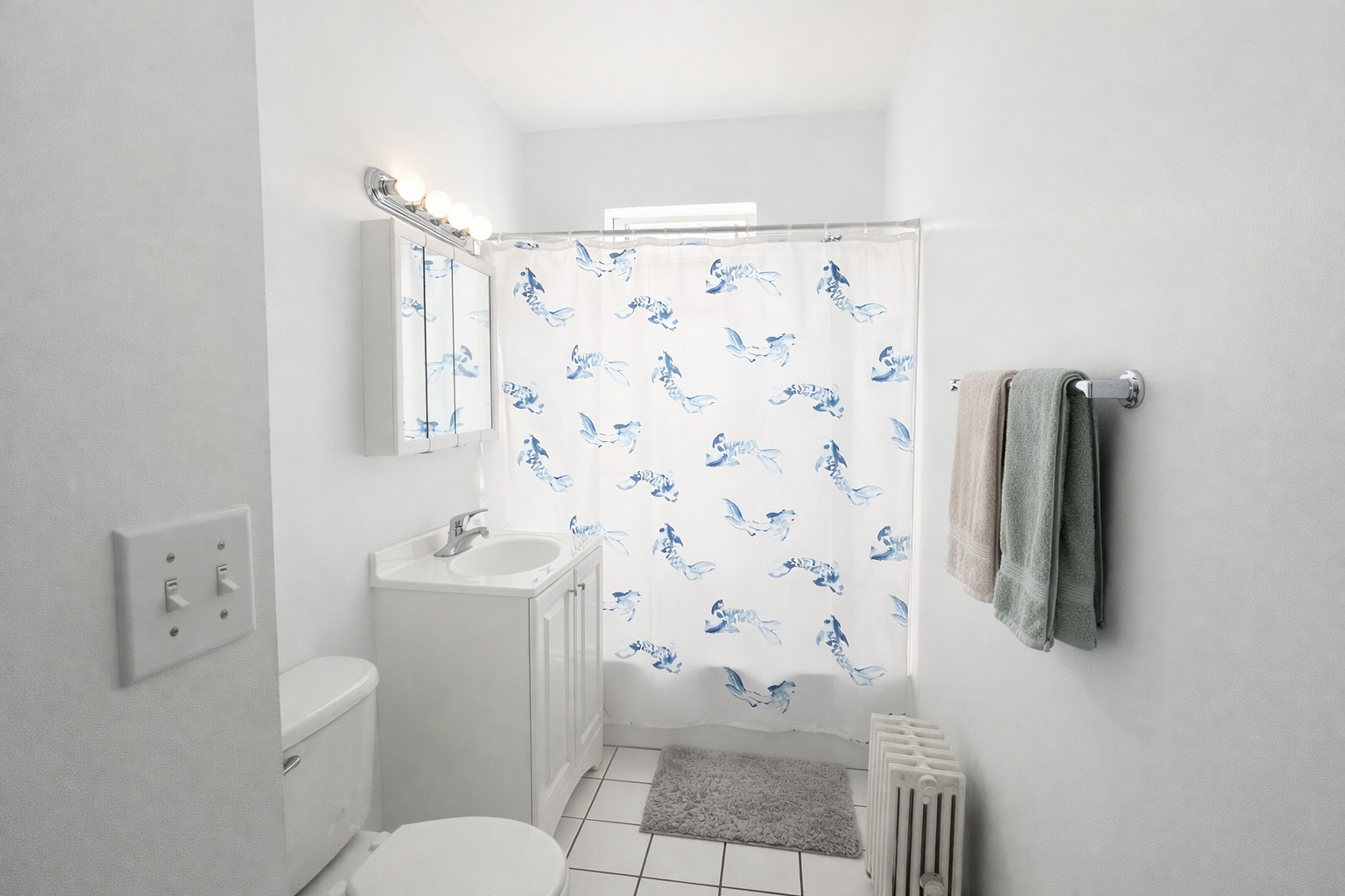 2461 North Clark Street, Unit 3 Chicago, IL 60614 - Photo 7 of 10 a bathroom with a shower toilet and sink
