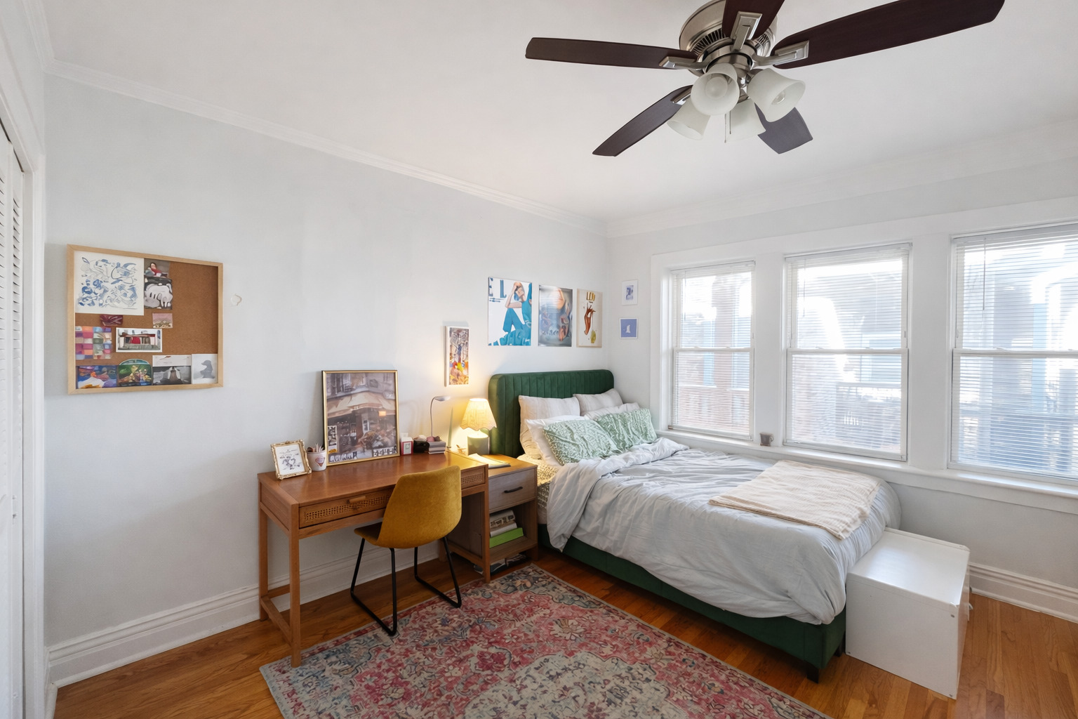 2461 North Clark Street, Unit 3 Chicago, IL 60614 - Photo 9 of 10 a bedroom with a bed table chair and a window