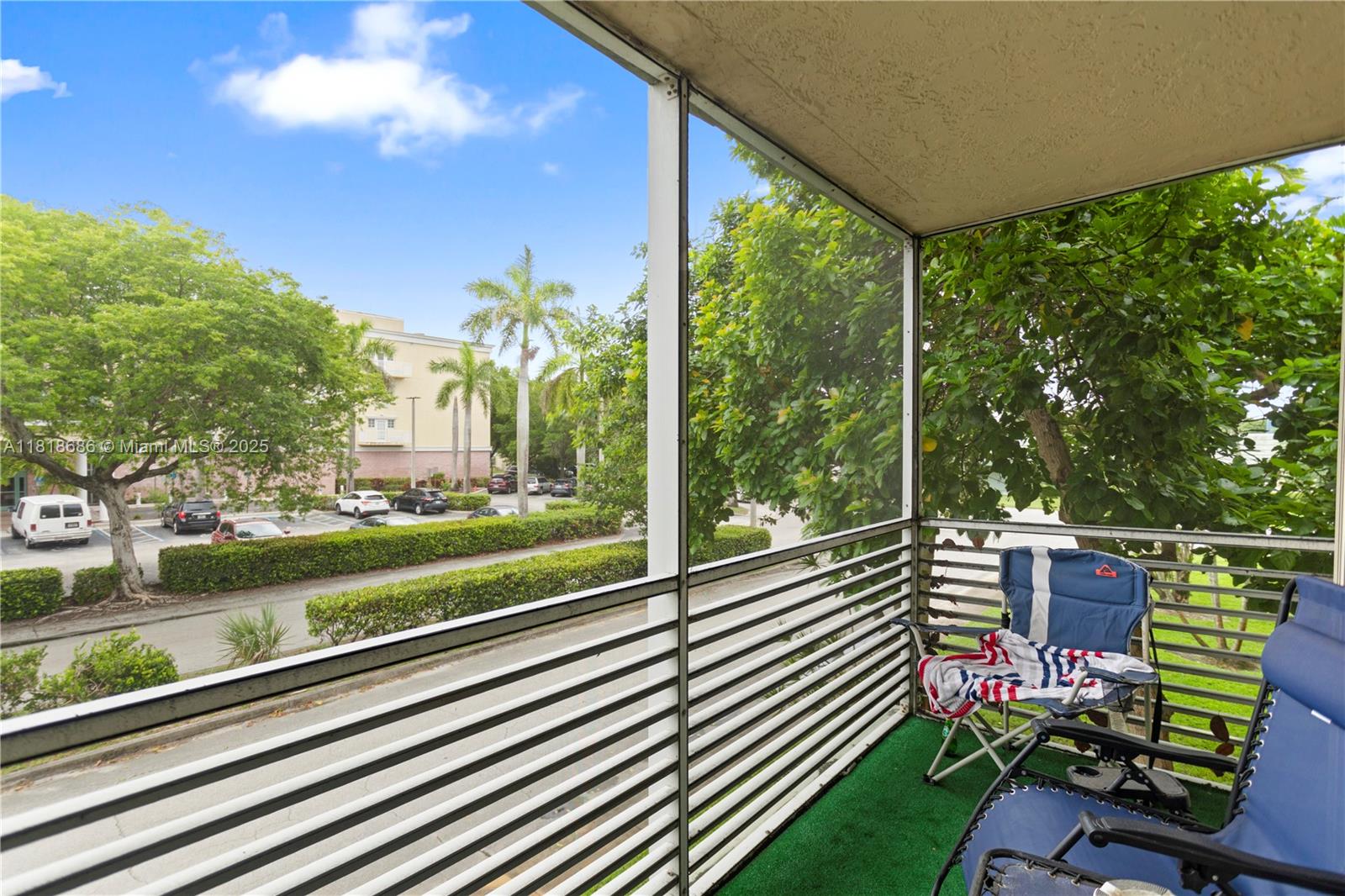 5790 Stirling Road, Unit 212 Hollywood, FL 33021 - Photo 21 of 22 a view of a two chair in the balcony