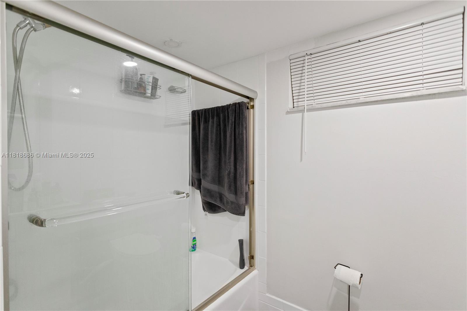 5790 Stirling Road, Unit 212 Hollywood, FL 33021 - Photo 8 of 22 a bathroom with a shower and a shower