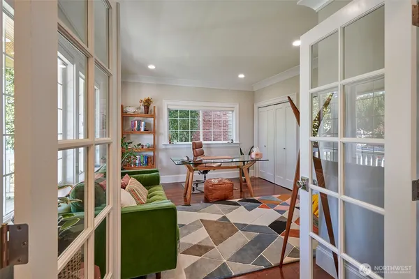 a workspace with furniture and a window