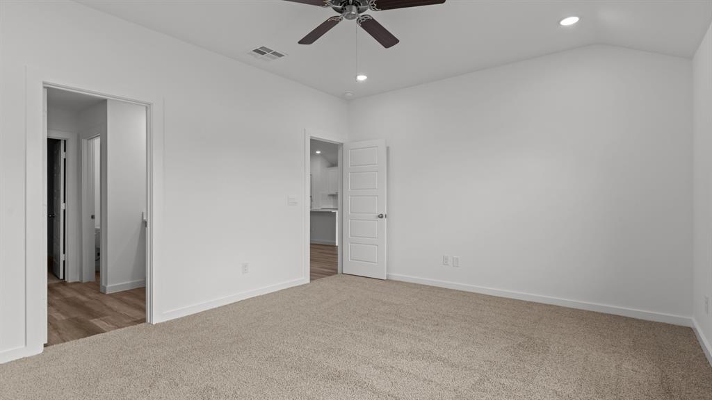 3408 Rendezvous Way Sherman, TX 75090 - Photo 17 of 21 Unfurnished bedroom featuring recessed lighting, light carpet, and a ceiling fan