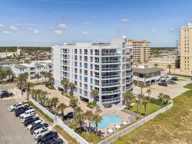 a view of city with ocean