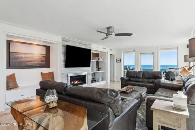 a spacious bathroom with a granite countertop sink a mirror and shower