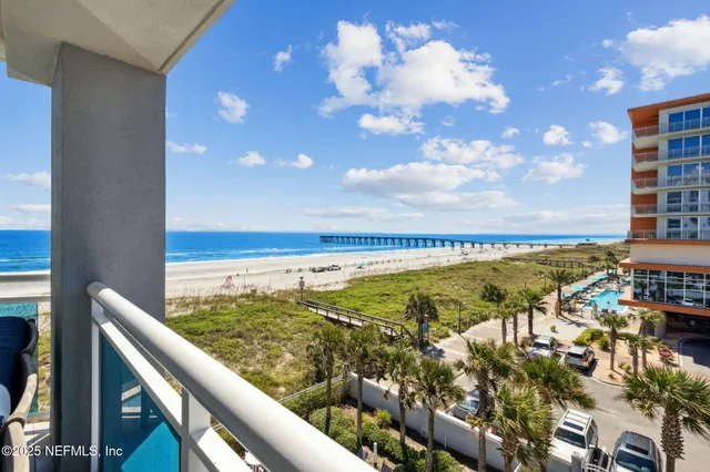 a bathroom with a granite countertop sink mirror and shower