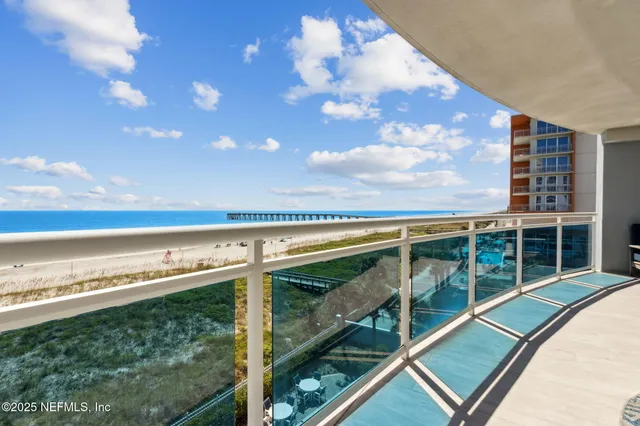 a bathroom with a sink double vanity granite and a mirror