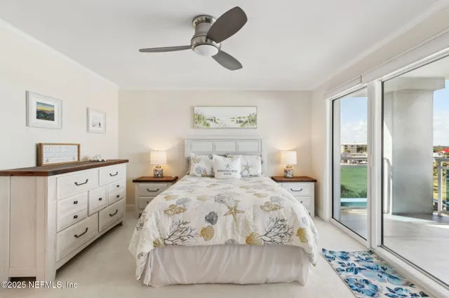 a view of swimming pool with outdoor seating and plants