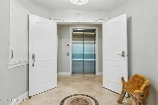 a kitchen with stainless steel appliances granite countertop a sink and a stove