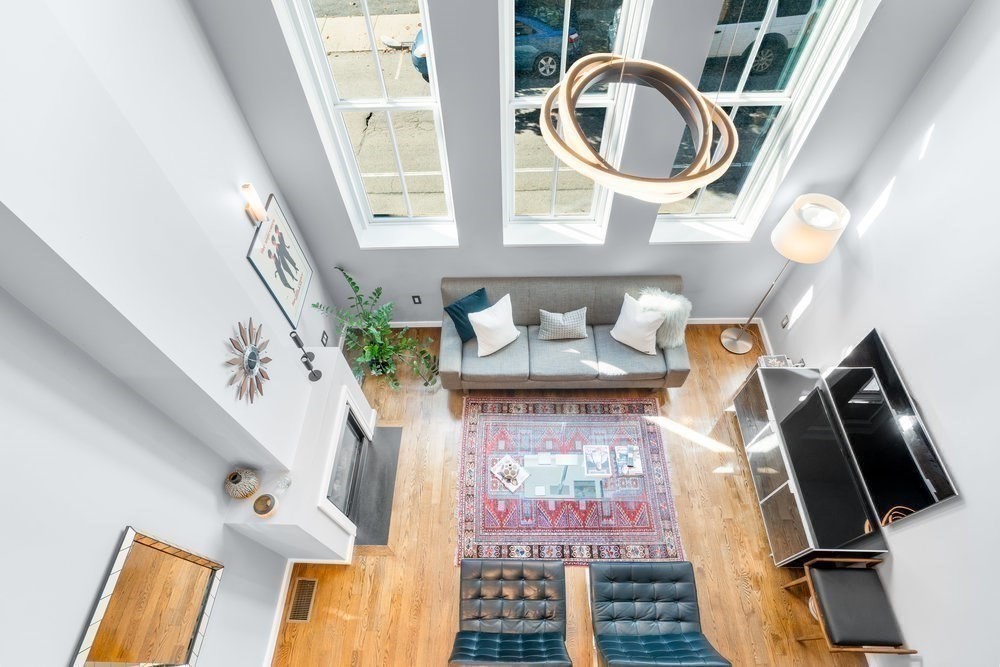 66 Seaverns Avenue, Unit 68B Boston, MA 02130 - Photo 13 of 30 a front view of a house with a sink and wooden floor