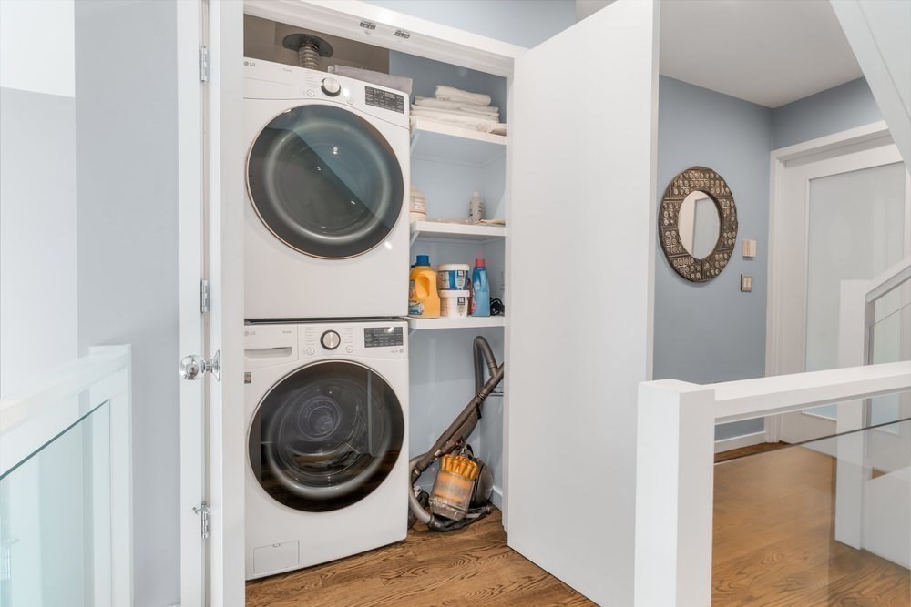 66 Seaverns Avenue, Unit 68B Boston, MA 02130 - Photo 18 of 30 a view of washer and dryer in a utility room