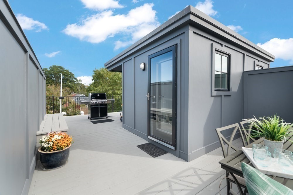 66 Seaverns Avenue, Unit 68B Boston, MA 02130 - Photo 20 of 30 a view of a porch with furniture and a yard