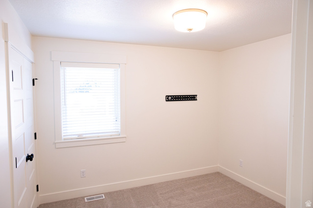 2218 South 635 West, Unit A Perry, UT 84302 - Photo 12 of 18 Neutral-toned carpet flooring