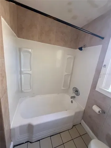 a bathroom with a bathtub