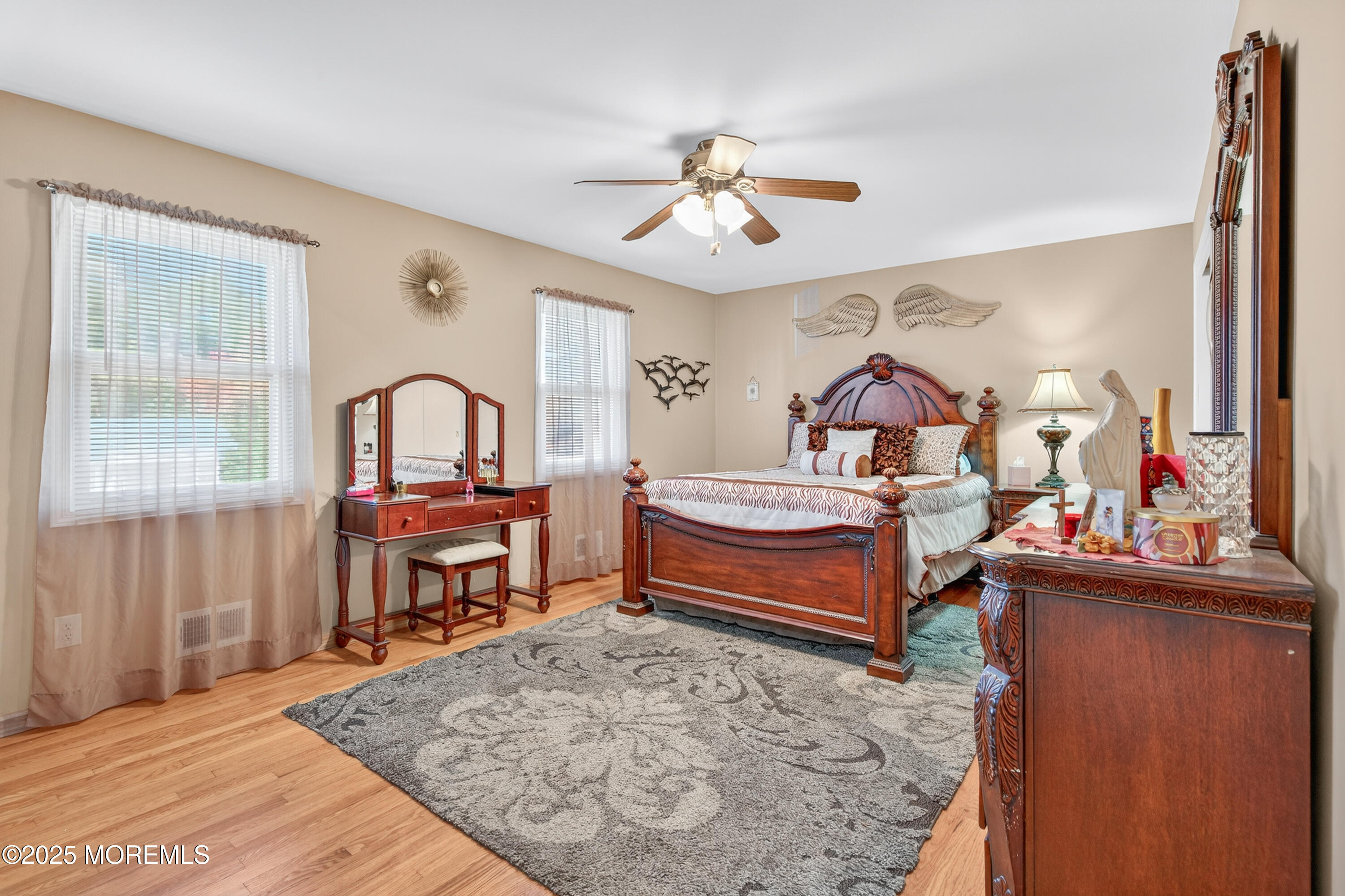 35 Heather Road Toms River, NJ 08753 - Photo 17 of 40 a bedroom with a bed and a dresser