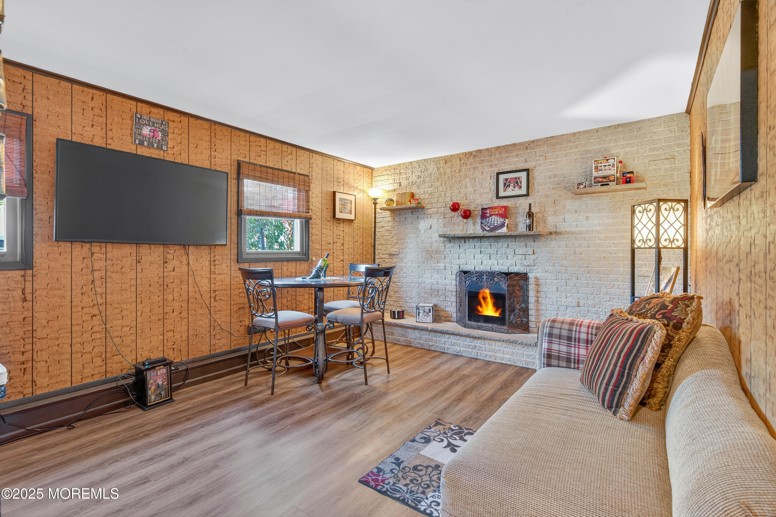 35 Heather Road Toms River, NJ 08753 - Photo 24 of 40 a living room with furniture and a fireplace