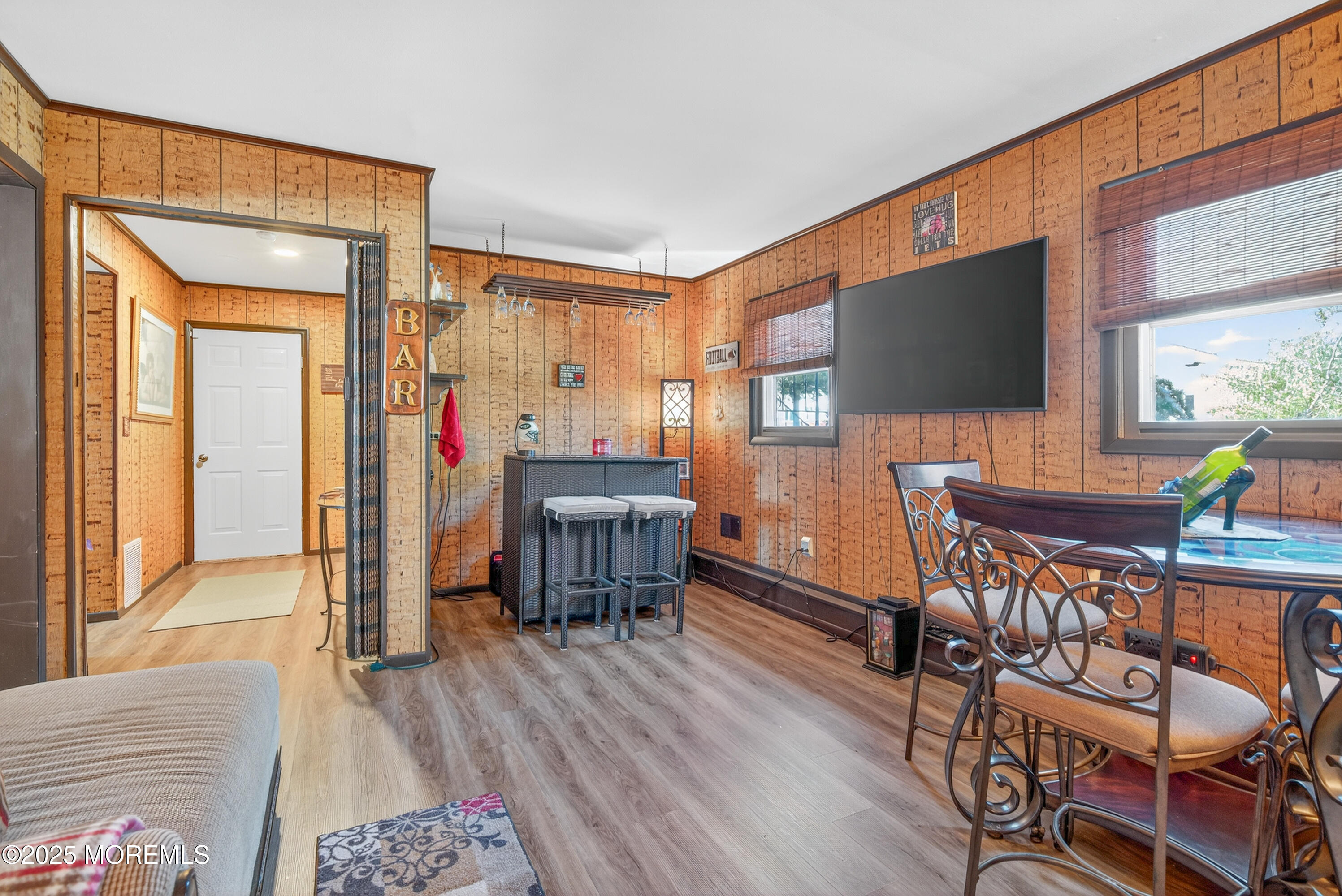 35 Heather Road Toms River, NJ 08753 - Photo 25 of 40 a view of a livingroom with furniture and a flat screen tv