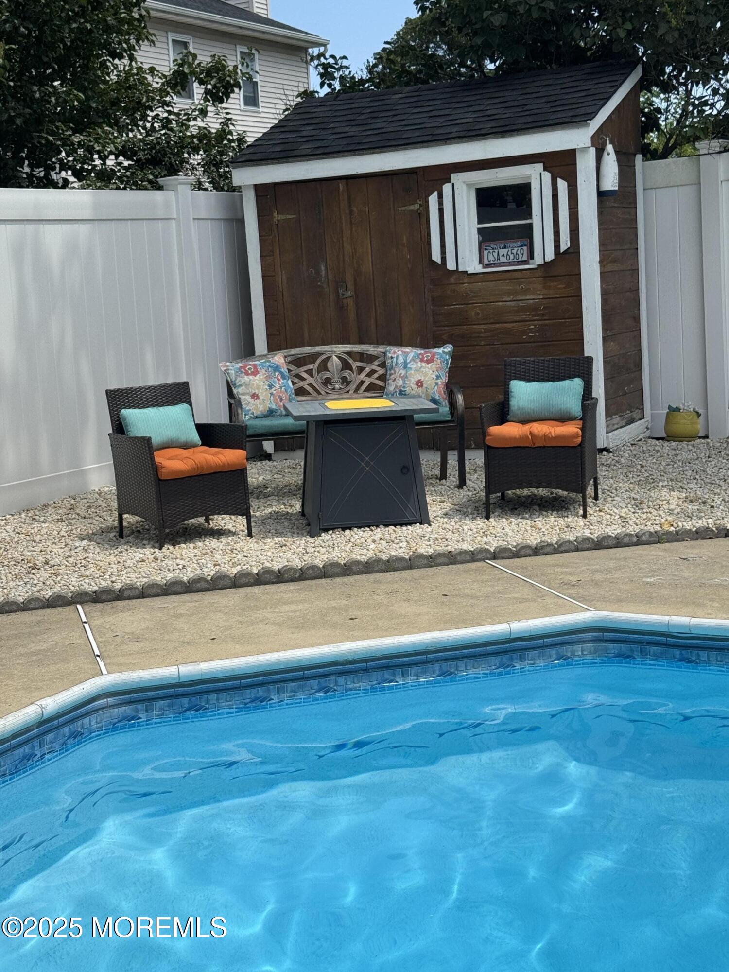 35 Heather Road Toms River, NJ 08753 - Photo 34 of 40 a living room with furniture and a wooden floor