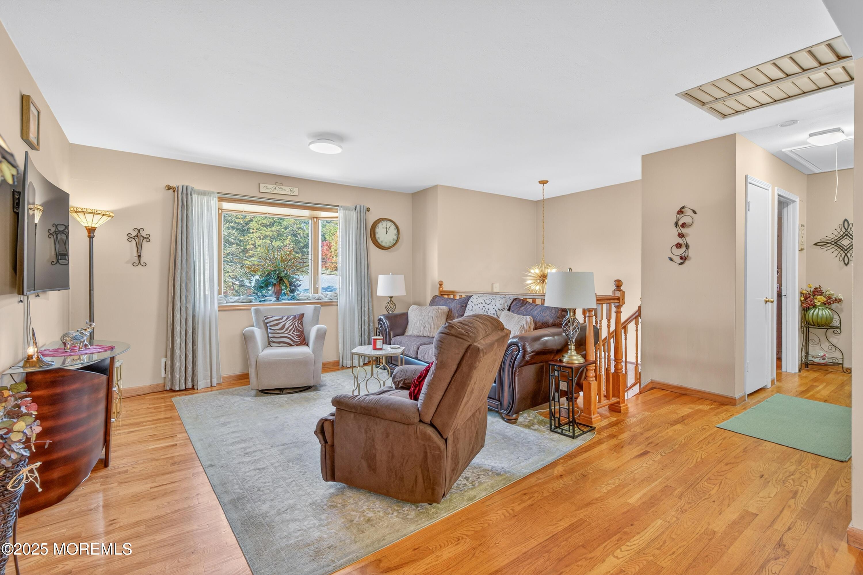 35 Heather Road Toms River, NJ 08753 - Photo 8 of 40 a living room with furniture and a large window