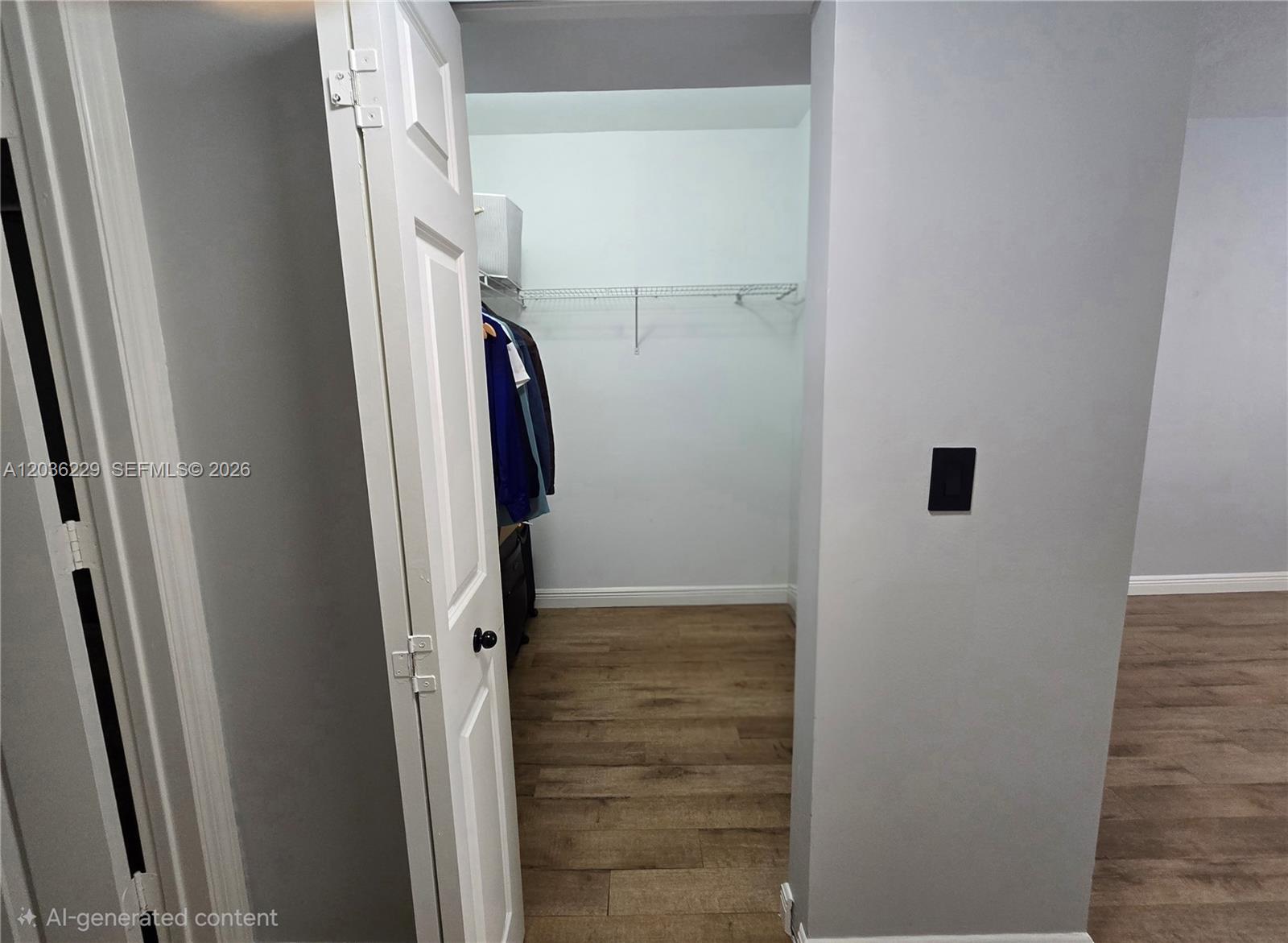 888 Douglas Road, Unit 605 Coral Gables, FL 33134 - Photo 13 of 21 a view of walk in closet