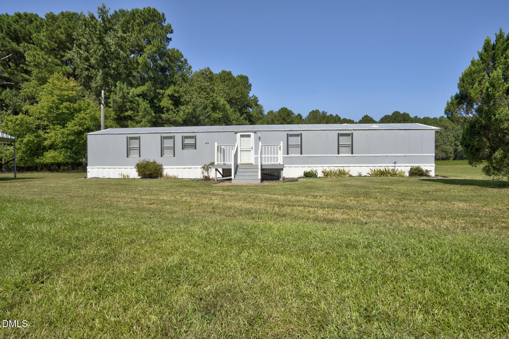 6515 Tonya Road Elm City, NC 27822 - Photo 31 of 52 a view of a house with a yard