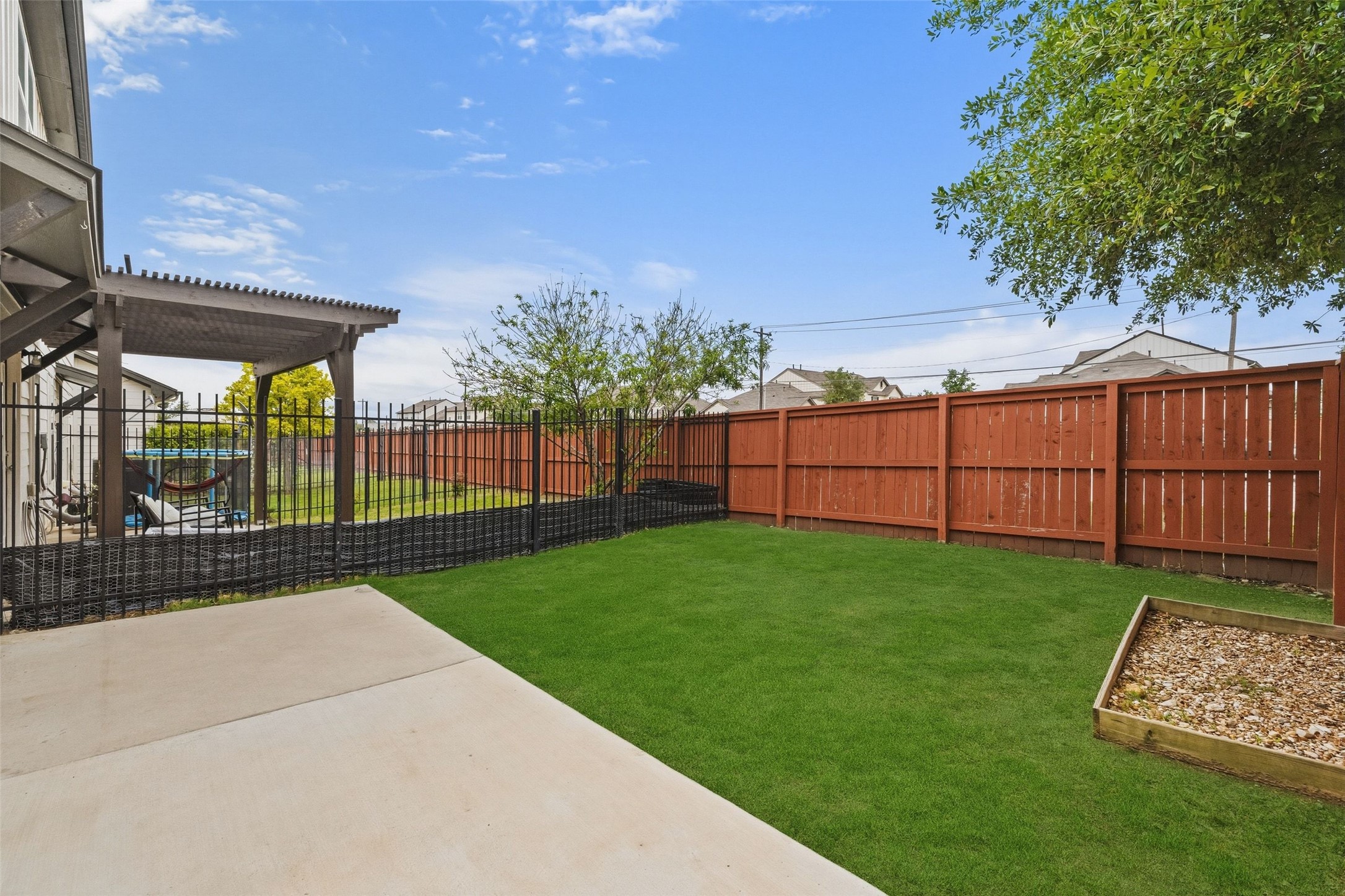 1615 Airedale Road Austin, TX 78748 - Photo 38 of 39 a view of a backyard with wooden fence