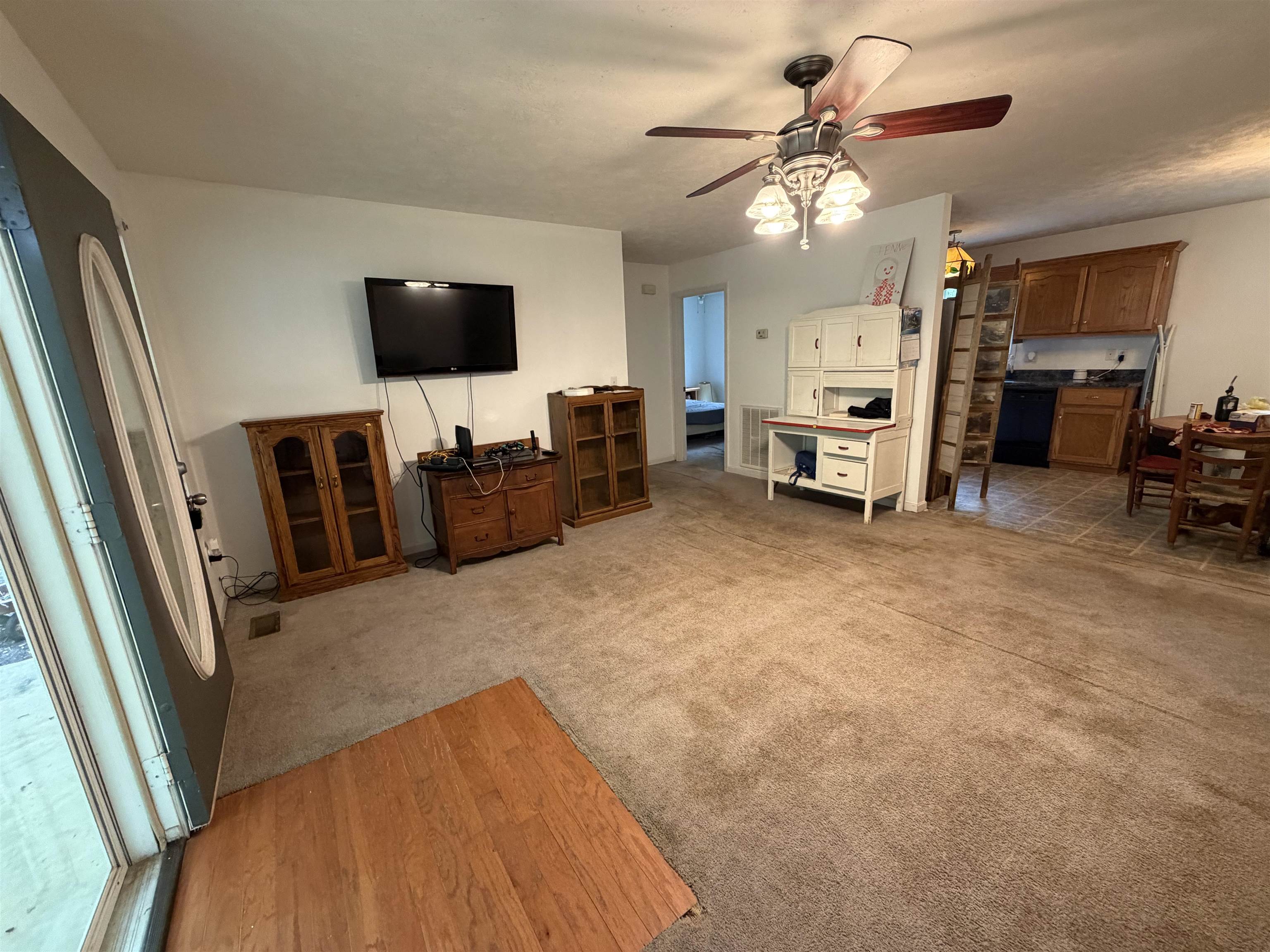191 Crabtree Road Selmer, TN 38375 - Photo 8 of 18 a view of a livingroom with furniture and a flat screen tv