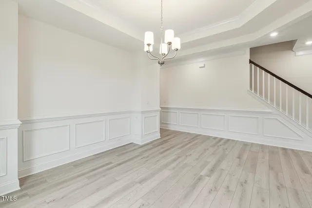 a kitchen with a sink and large window