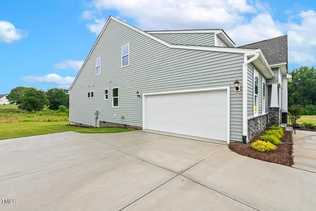 a view of a balcony with wooden floor