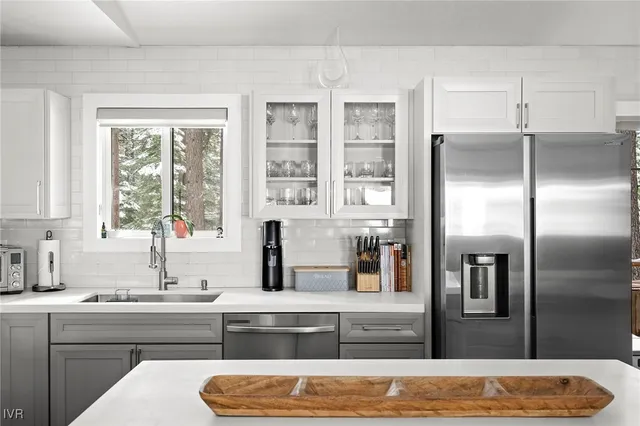 a bedroom with bed and window