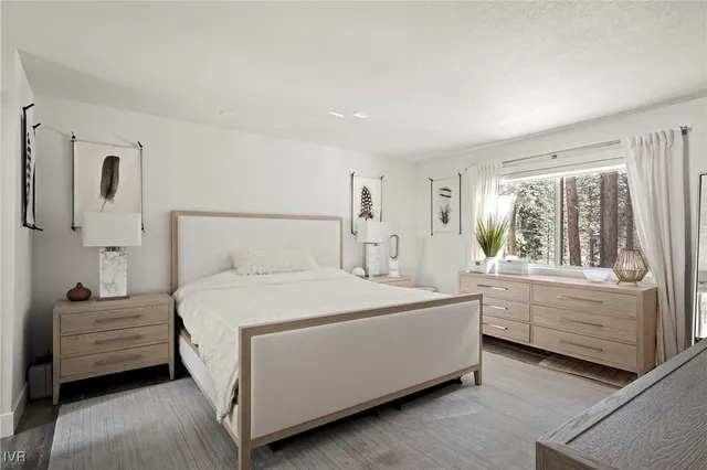 a bedroom with a bed and a couch