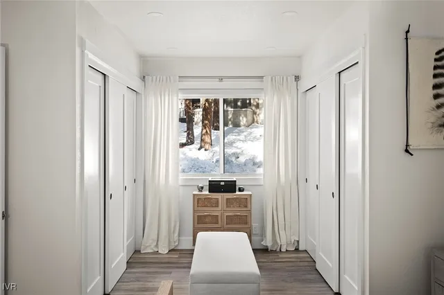 a spacious bathroom with a shower sink and mirror