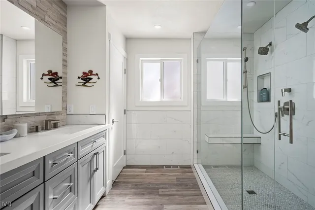a bathroom with a sink and a mirror