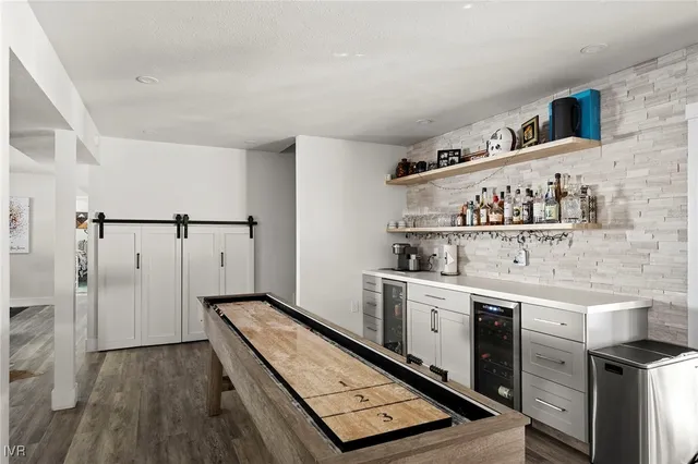 a close view of sink and cabinets