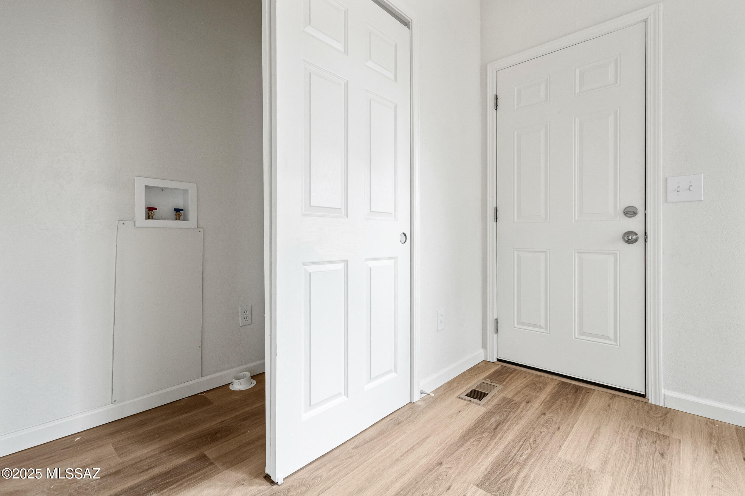 744 West Simmons Road Tucson, AZ 85705 - Photo 23 of 27 Laundry Closet