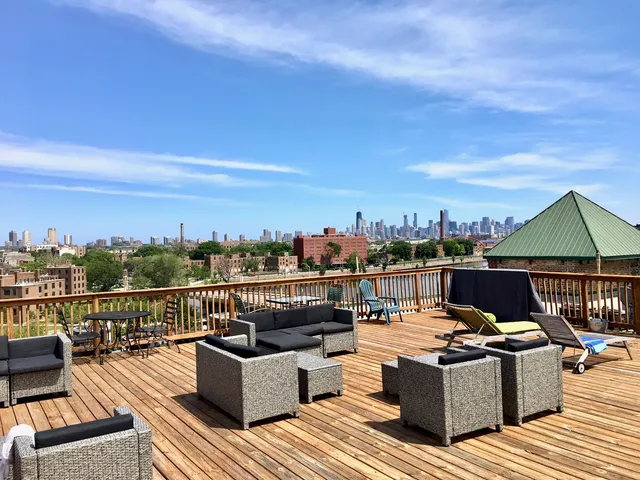 a view of a roof deck with couches