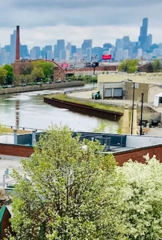 a view of a city with tall buildings
