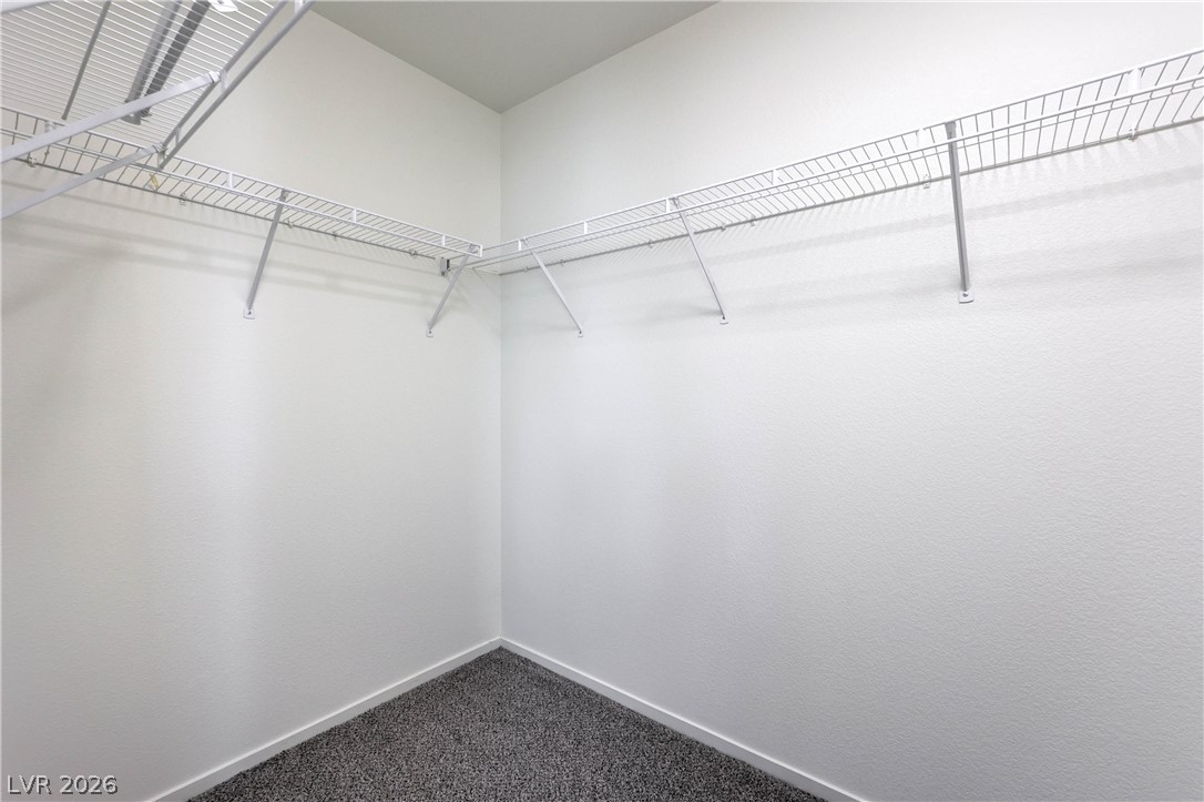 10939 Paradise Road Henderson, NV 89052 - Photo 26 of 36 Functional wire shelving provides ample storage in this well-appointed closet.