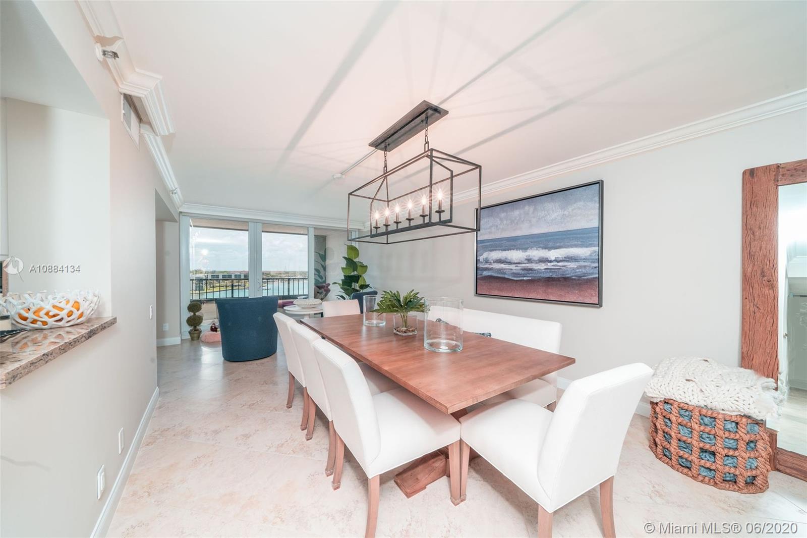 19900 South Beach Road, Unit 803 Jupiter, FL 33469 - Photo 12 of 64 a view of a dining room with furniture