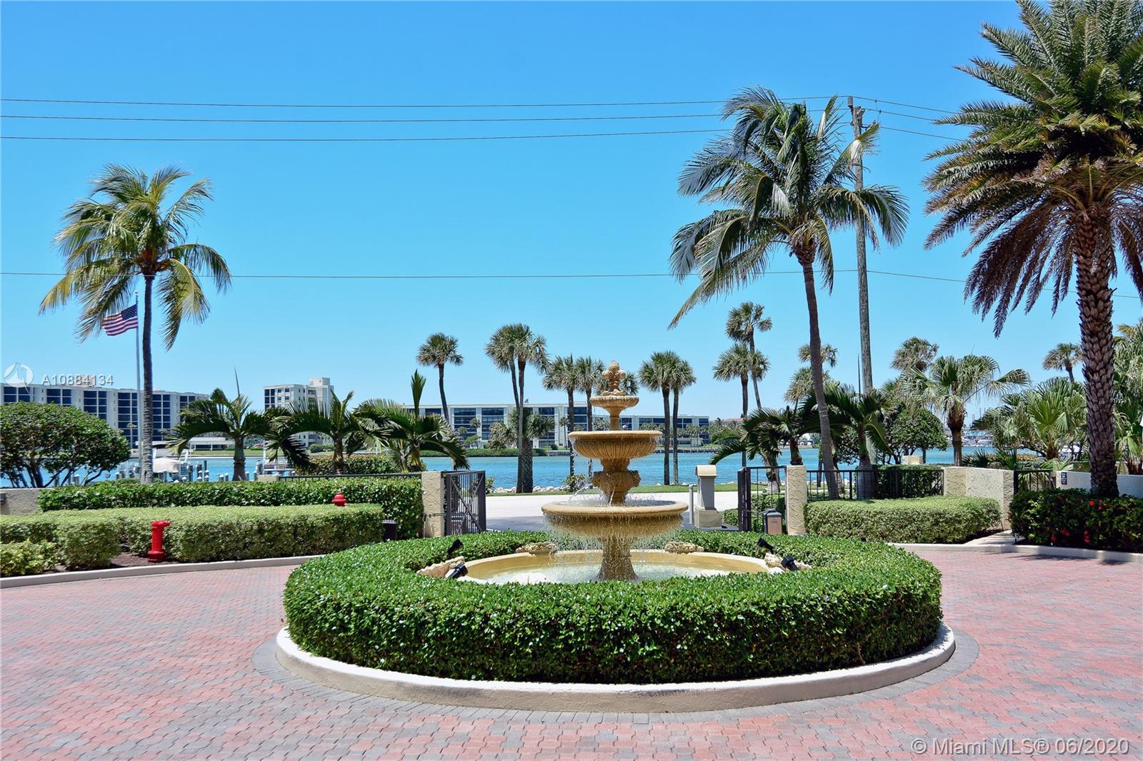 19900 South Beach Road, Unit 803 Jupiter, FL 33469 - Photo 5 of 64 a view of a swimming pool with a table and chairs