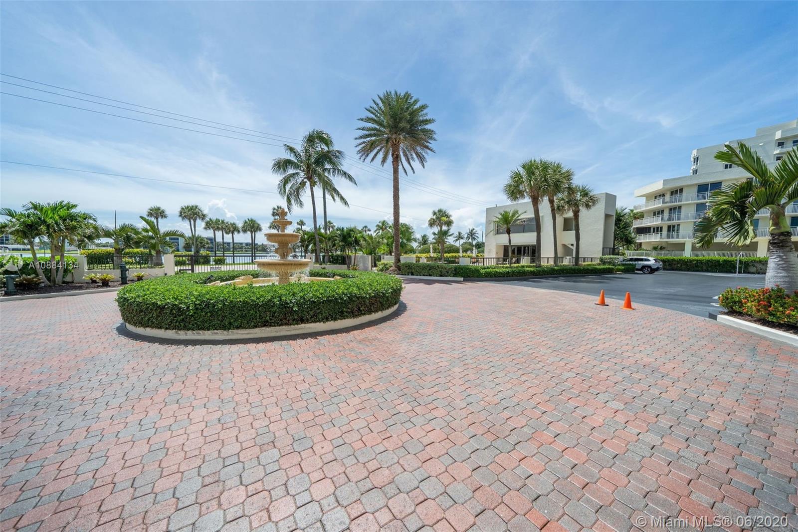 19900 South Beach Road, Unit 803 Jupiter, FL 33469 - Photo 53 of 64 a view of a swimming pool and a yard