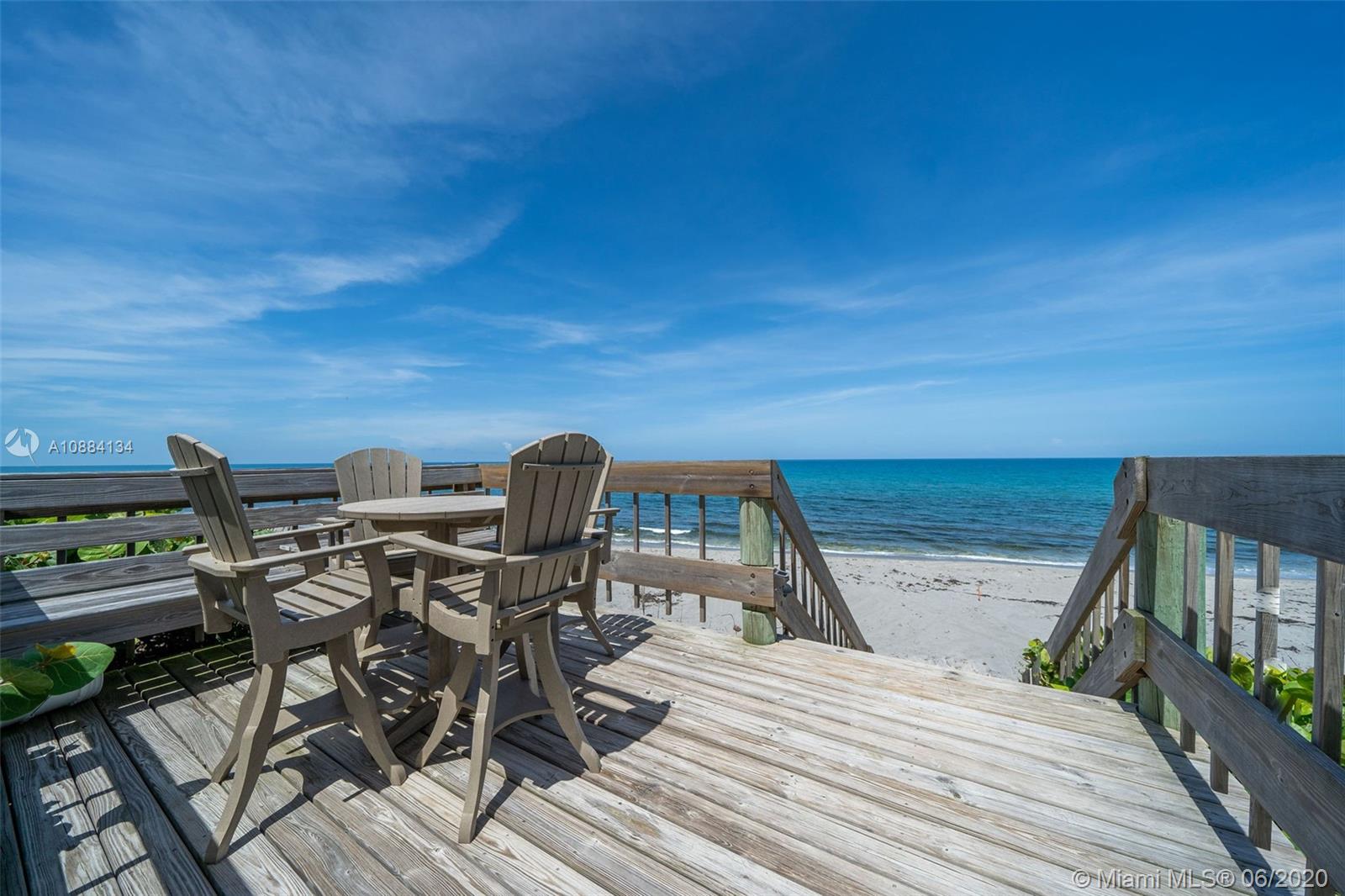 19900 South Beach Road, Unit 803 Jupiter, FL 33469 - Photo 60 of 64 a view of a balcony with chairs