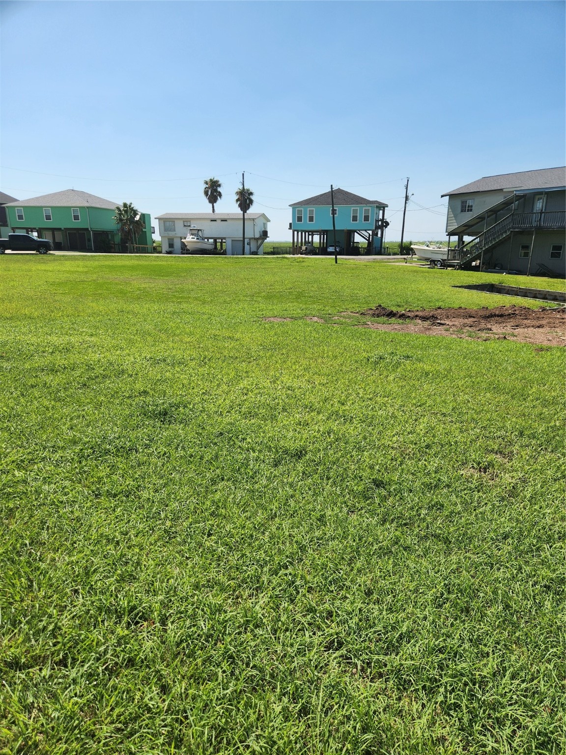 a view of a backyard of the house