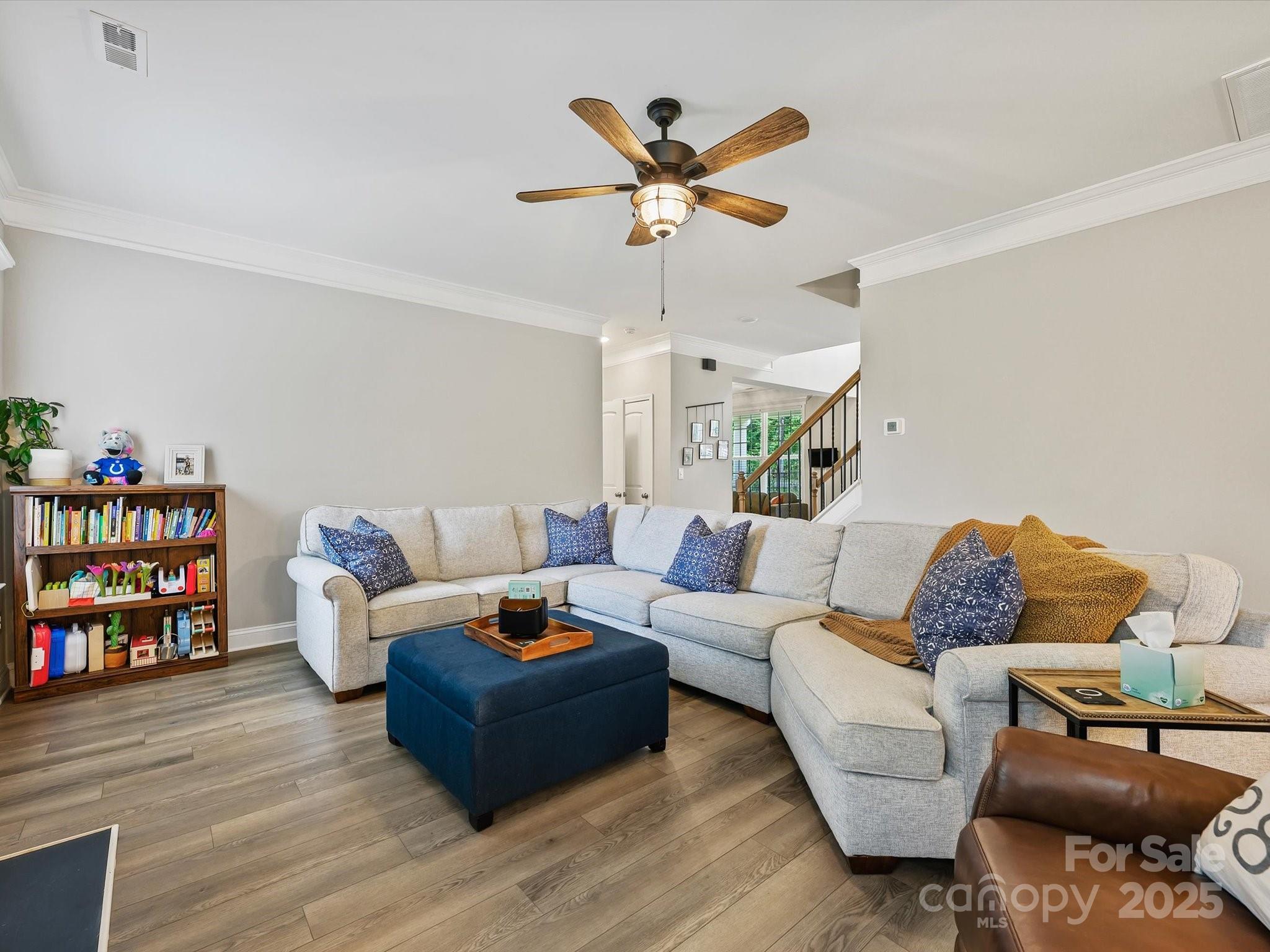 2901 South Point Road Belmont, NC 28012 - Photo 11 of 35 a living room with furniture and a wooden floor