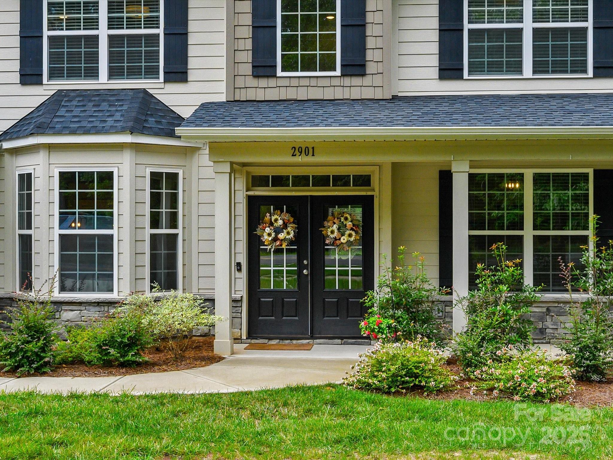 2901 South Point Road Belmont, NC 28012 - Photo 2 of 35 a view of a brick building with a large windows