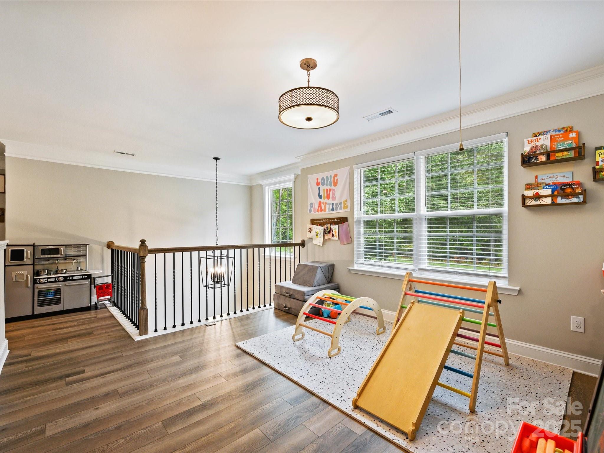 2901 South Point Road Belmont, NC 28012 - Photo 21 of 35 a living room with furniture and a large window