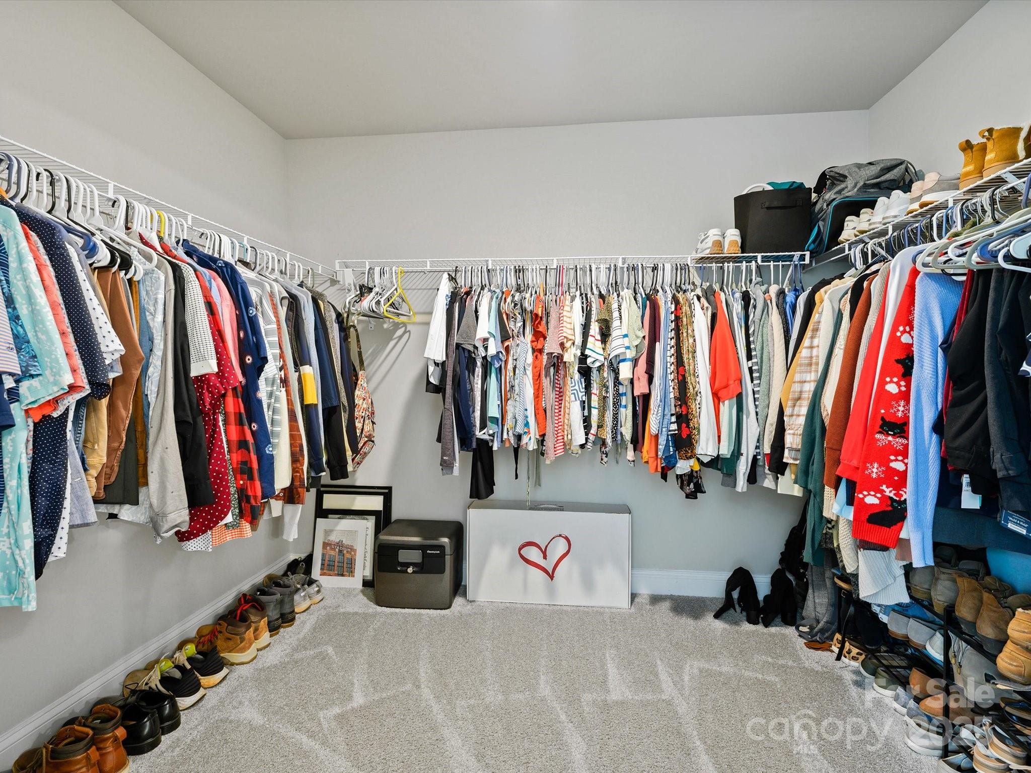 2901 South Point Road Belmont, NC 28012 - Photo 29 of 35 a view of walk in closet with clothes